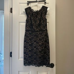 Black lace women’s dress with nude undertones